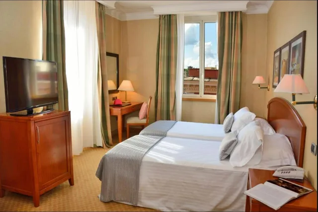غرفة قياسية بسرير مزدوج أو سريرين منفصلين، LH Hotel Lloyd Rome 1/3