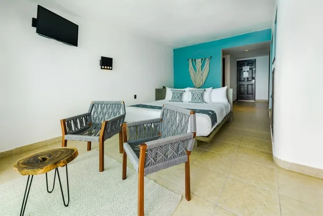 غرفة ديلوكس بسرير كينج بإطلالة على البحر، Hotel B Cozumel 5/7