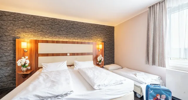 غرفة كومفورت ثلاثية بسرير مزدوج، Plaza Hotel Zwickau 2/7