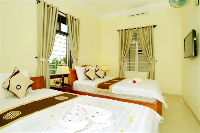 غرفة عائلية بسريرين مزدوجين بشرفة، Bamboo Garden Homestay 1/3