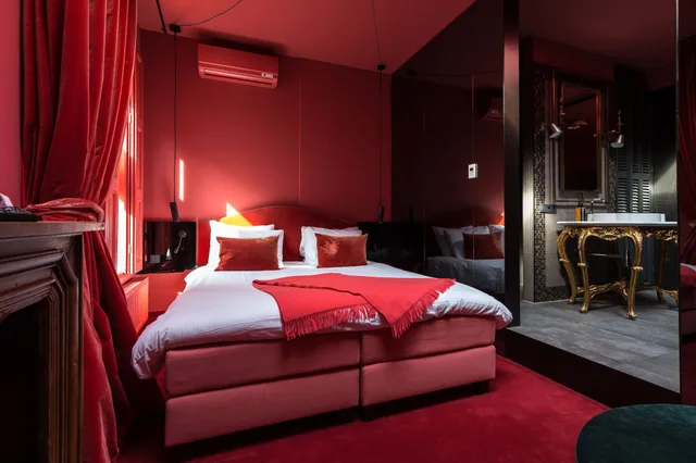 جناح رئاسي بسرير كينج بحوض استحمام في الطابق الأرضي، Boutiquehotel Staats 1/10
