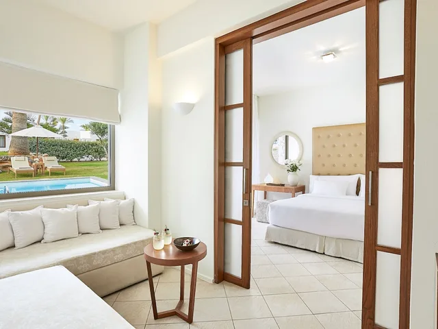 Swim Up, Family, Double and Twin Beds, Private Garden، Amirandes, A Resort to Live 5/8