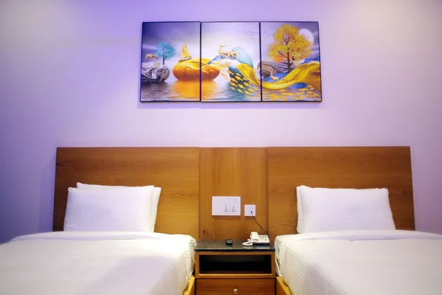 غرفة قياسية بسريرين منفصلين، Comfort Inn Kaikaluru 4/4