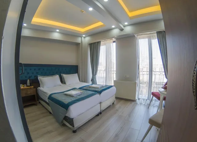 غرفة بسرير مزدوج بإطلالة على البحر بشرفة، Hotel Esen 2/6