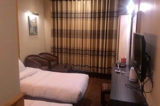 دوبلكس عائلي بسرير كوين وسريرين منفصلين بغرفتي نوم، Little Nepal Inn 1/1