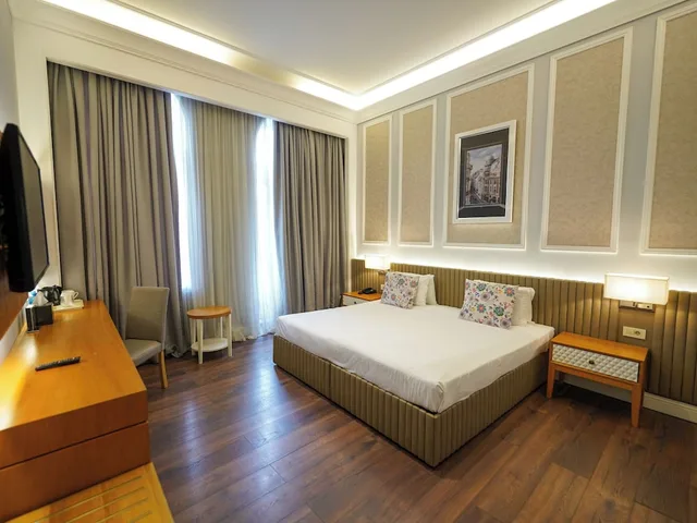 غرفة ديلوكس بسرير كينج، Promenade Hotel 5/10