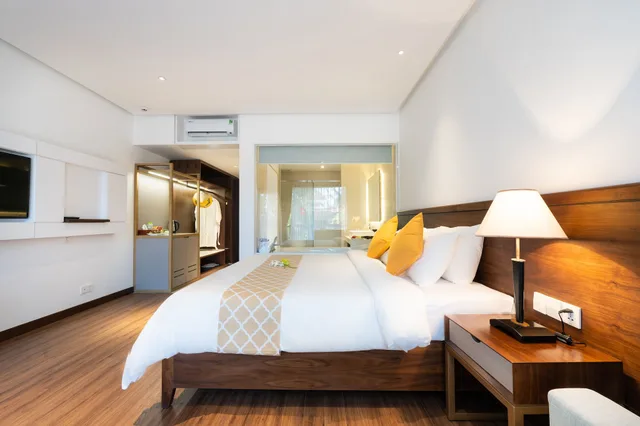 غرفة ديلوكس بسرير كينج بإطلالة على الحديقة، Hoang Ngoc Beach Resort 4/9