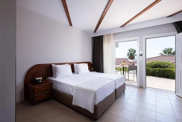 غرفة عائلية بأربعة أسرّة بإطلالة على الحديقة، Alexandros Palace Hotel and Suites 4/10