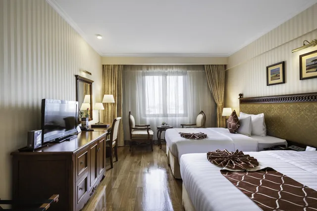 غرفة ديلوكس بسريرين منفصلين، Hotel Grand Saigon 3/5