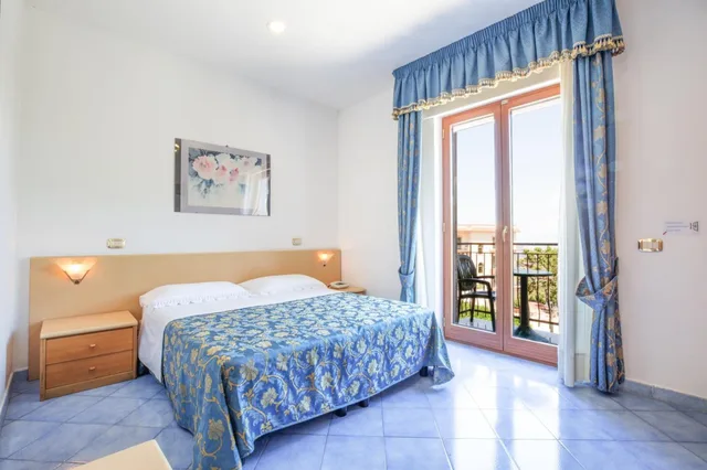 غرفة قياسية بسرير مزدوج أو سريرين منفصلين، Hotel La Pergoletta 2/3