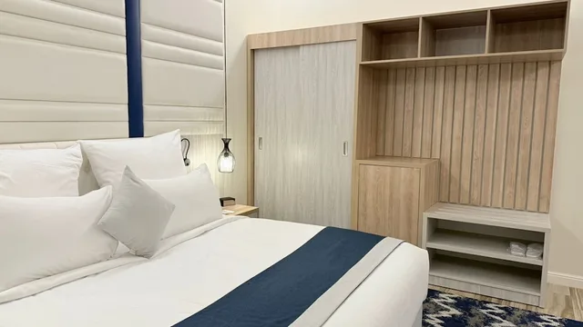 غرفة سوبيريور بسرير كينج وسرير كوين بشرفة، Le Reve Hotel 4/10