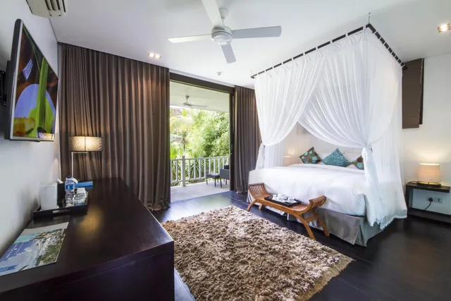 جناح بسرير كينج بإطلالة على الحديقة، MONTIGO RESORTS SEMINYAK 1/2