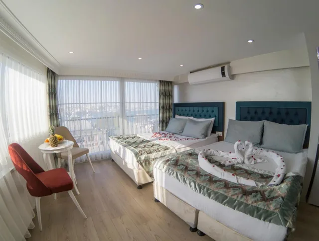 غرفة ديلوكس رباعية بسريرين مزدوجين، Hotel Esen 1/1