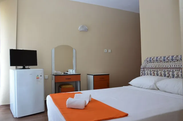 غرفة رباعية بسرير مزدوج وسريرين منفصلين، Nil Hotel 5/9