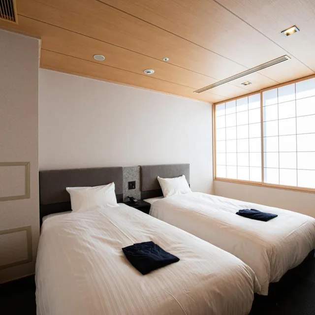 غرفة بسريرين منفصلين بأرضية تاتامي، Welina Hotel Premier Osaka Namba 1/4