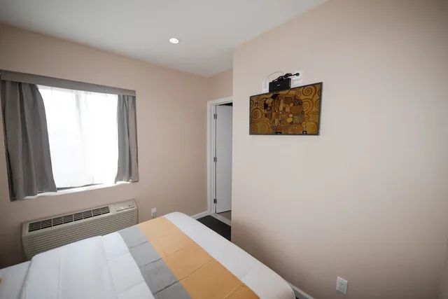 غرفة أساسية بسرير كوين، Flushing Garden Hotel 7/9