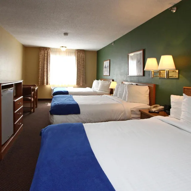 جناح بسرير كينج، New Victorian Inn and Suites 2/3