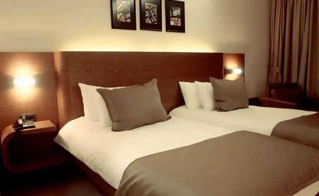 غرفة قياسية بسرير مزدوج أو سريرين منفصلين، Emerald Hotel 4/4