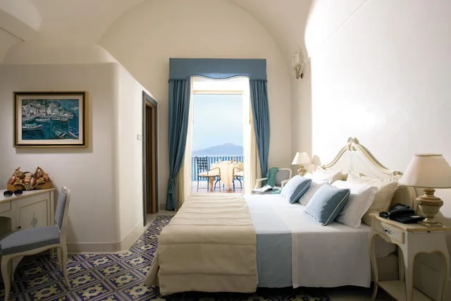 غرفة ديلوكس بسرير كوين بإطلالة على البحر، Grand Hotel Angiolieri 1/5