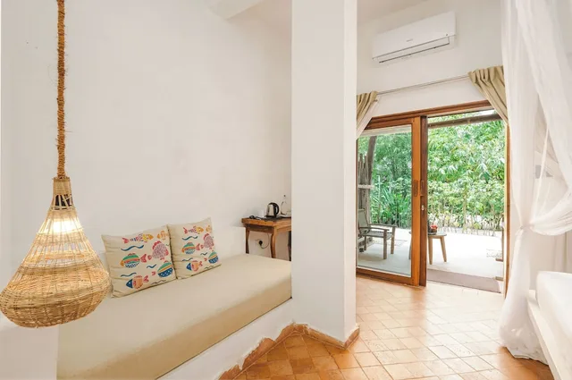 غرفة ديلوكس ثلاثية بسرير كينج وسرير فردي بإطلالة على الحديقة، Mvuvi Boutique Resort 2/10