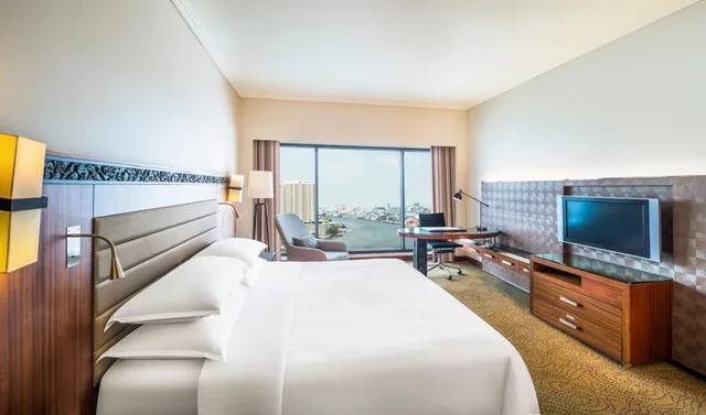 غرفة ديلوكس بسرير كينج بإطلالة على النهر، Royal Orchid Sheraton Riverside Hotel Bangkok 2/8