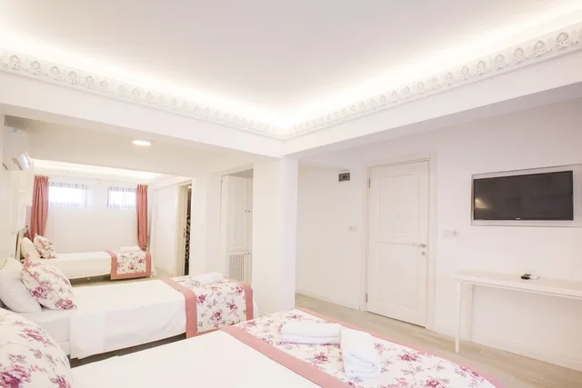 غرفة اقتصادية رباعية بسرير مزدوج وسريرين منفصلين، Aksoy Butik Otel 4/4