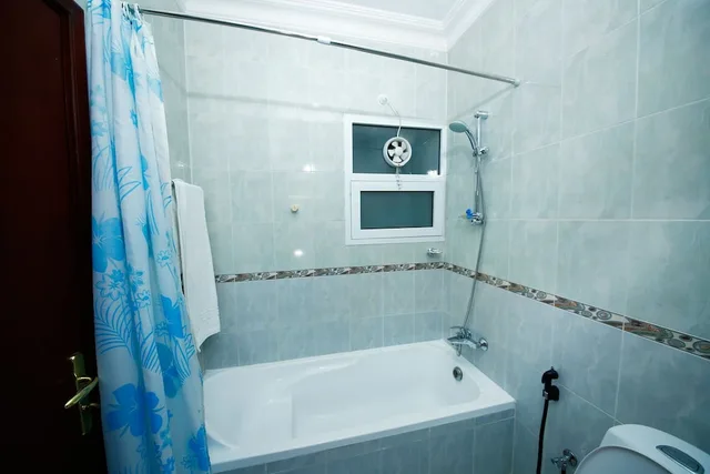 شقة ديلوكس بسرير كينج وسريرين منفصلين بغرفتي نوم، Muscat International Hotel 4/4