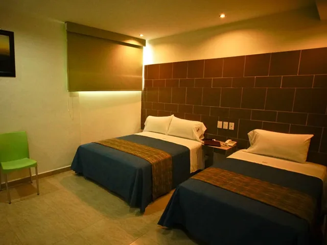 غرفة عائلية بسرير كينج وسرير فردي، First Inn Hotel and Business 7/10