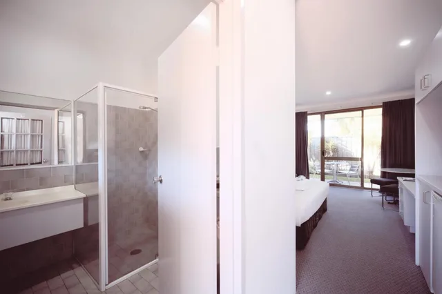 غرفة قياسية بسرير كينج، ISLAND PALMS MOTOR INN 4/4