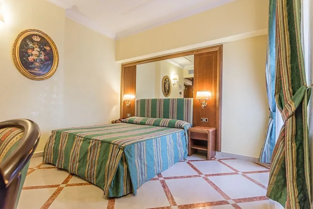 غرفة قياسية بسريرين منفصلين، Raeli Hotel Lazio 1/4