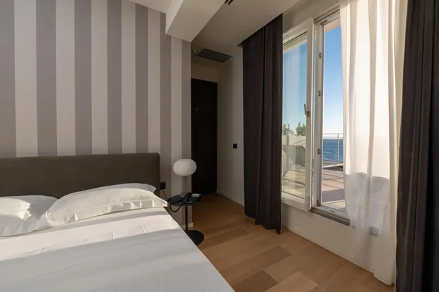 غرفة بسرير مزدوج أو سريرين منفصلين بشرفة، Hotel Punta Tipa 1/6