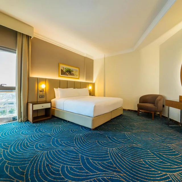 King 1BR Suite with Balcony, DoubleTree by Hilton Dubai Port Saeed. 2/3
