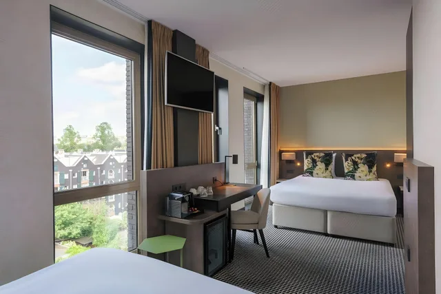 غرفة سوبيريور ثلاثية بسرير كوين بإطلالة على القناة، Monet Garden Hotel Amsterdam 2/3