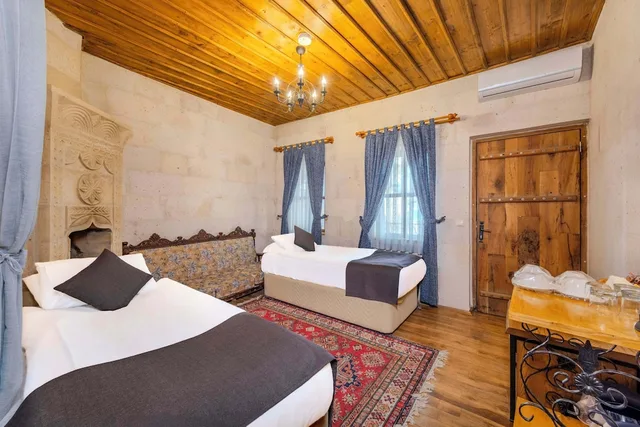 جناح ديلوكس بسريرين منفصلين وسرير كينج، Düven Hotel 6/10