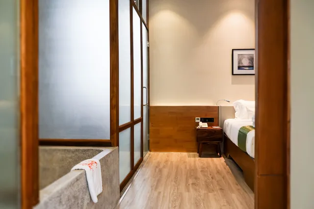 جناح جونيور بسرير مزدوج بمنطقة جلوس، G Mekong Hotel 5/7