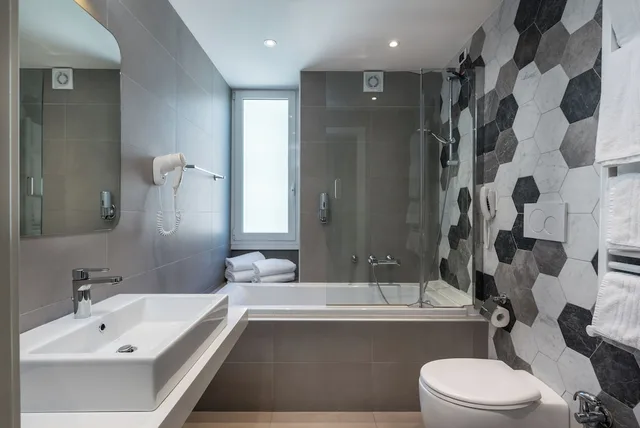 غرفة قياسية رباعية بسرير مزدوج وسريرين منفصلين، Noba Hotel e Residenze 6/6