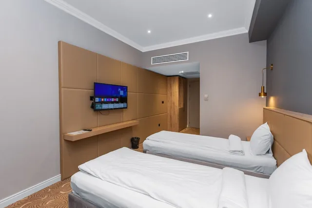غرفة عائلية بسرير كينج وسريرين منفصلين، Congress Hotel 1/10