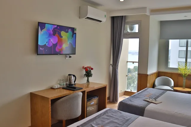 Superior, Quadruple, 2 Queen Beds, Sea View, Quang Vinh Hotel 1/2