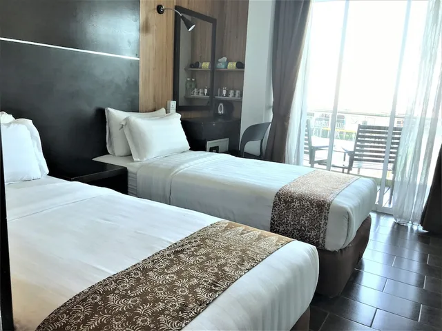 غرفة قياسية بسريرين منفصلين بإطلالة على البحر، Sipadan Inn 2 1/4