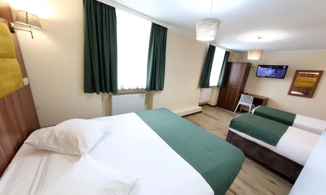 غرفة كومفورت رباعية بسرير فردي، Sun Hotel 2/10