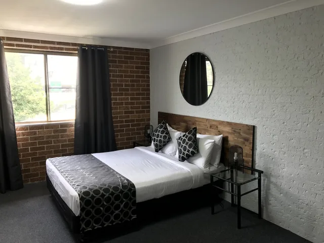 غرفة ديلوكس بسرير كوين بشرفة، Coffs Shearwater Motel 1/6