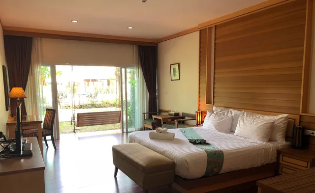 غرفة ديلوكس بسرير كينج، Taman Spa Resort 1/10