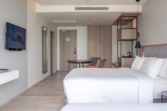 غرفة عائلية بإطلالة جزئية على البحر مع أريكة، Fortune Saeng Chan Beach Rayong 3/7