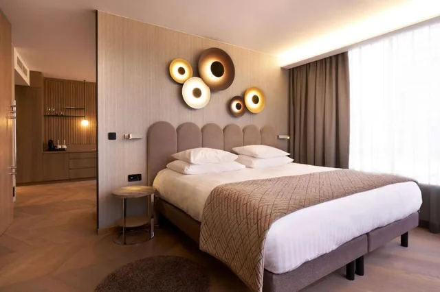 Suite, King Bed, City View, Bath and Shower, Living Area، Nordic Hotel Forum, WorldHotels Distinctive 2/5