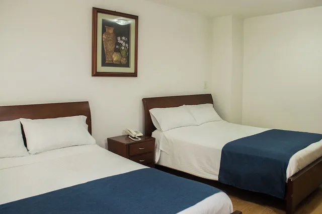 Room, 2 Queen Beds, Nogal Suite Hotel Pasto 1/8