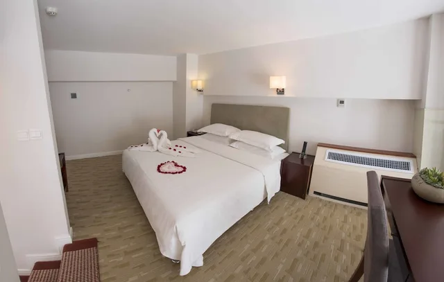 دوبلكس ديلوكس بسريرين كوين، Yantai Meiya International Apt. Hotel 2/4