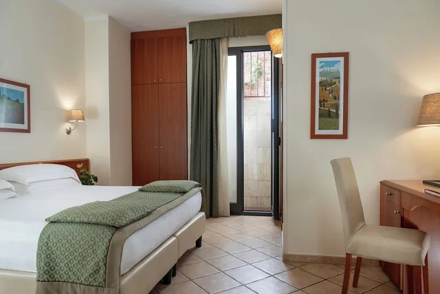 غرفة اقتصادية بسرير مزدوج أو سريرين منفصلين، Hotel Athena Siena 3/5