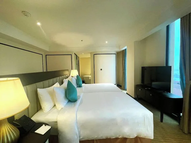غرفة بريميير ديلوكس بسريرين منفصلين، Charmant Suites a Boutique Hotel Can Tho 3/4