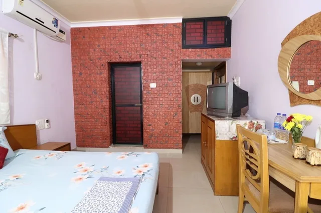 غرفة ديلوكس بسرير كينج بشرفة، Mama Mids Home 7/10
