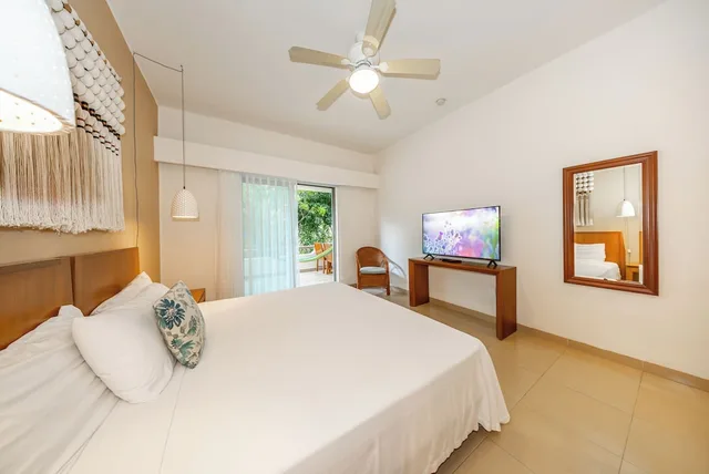 2 Bedrooms, Riviera, 1 King and 2 Double Beds, Garden View، Riviera Maya Suites 1/10